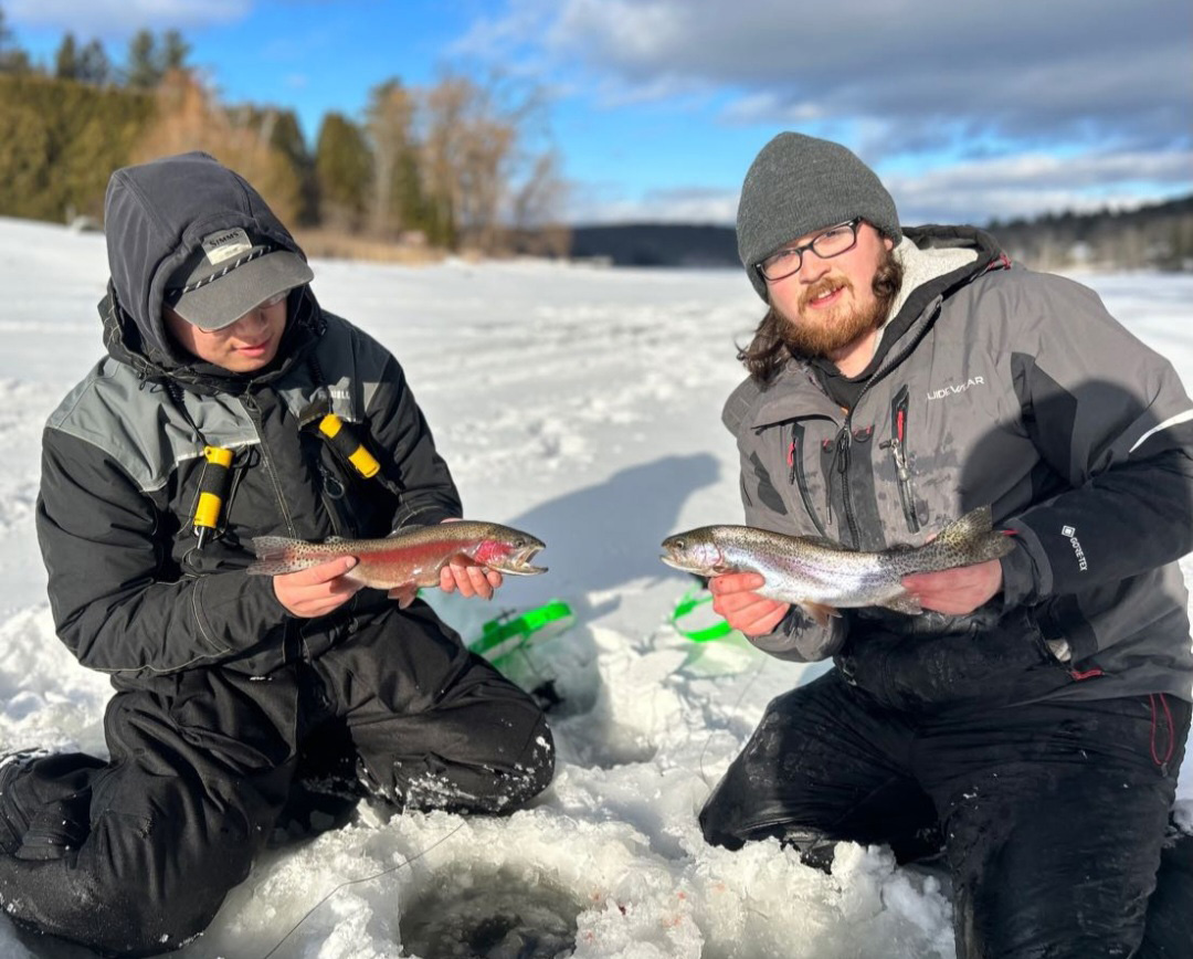 Trevor and Josh from The Fishing Hole with pair of rainbow trout.