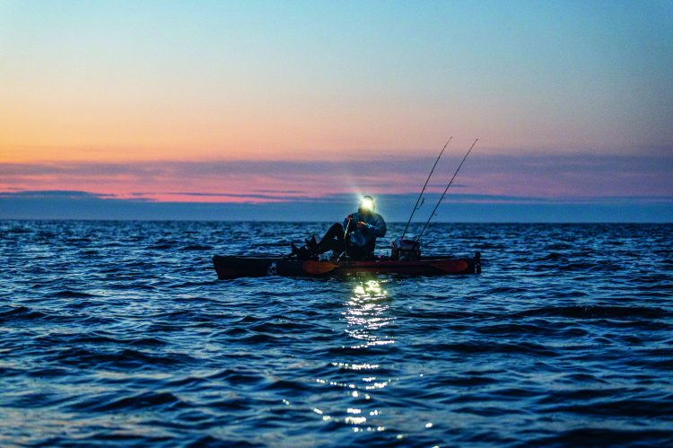nighttime kayak fishing for stripers