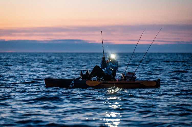 kayak fishing for stripers in Maine