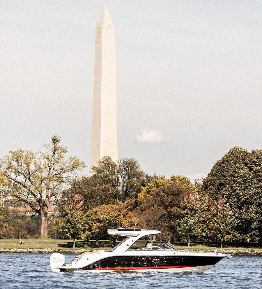boat in front of Washington Monument