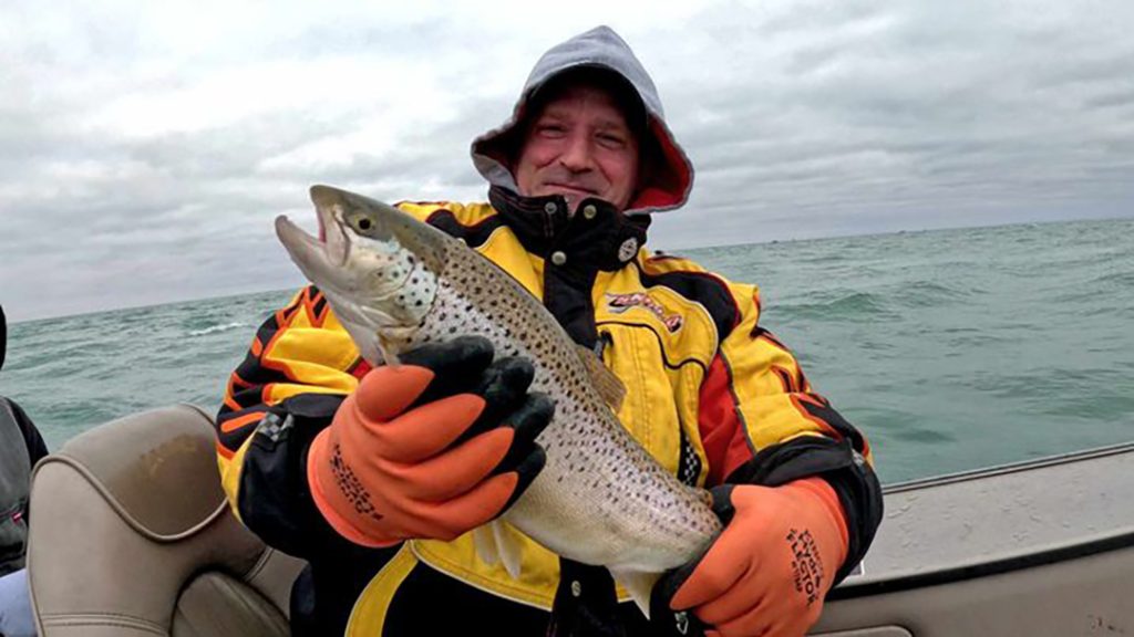 Mason Soliday with brown trout