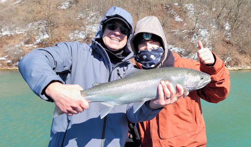 Kurt and Jaxson Heine with steelhead