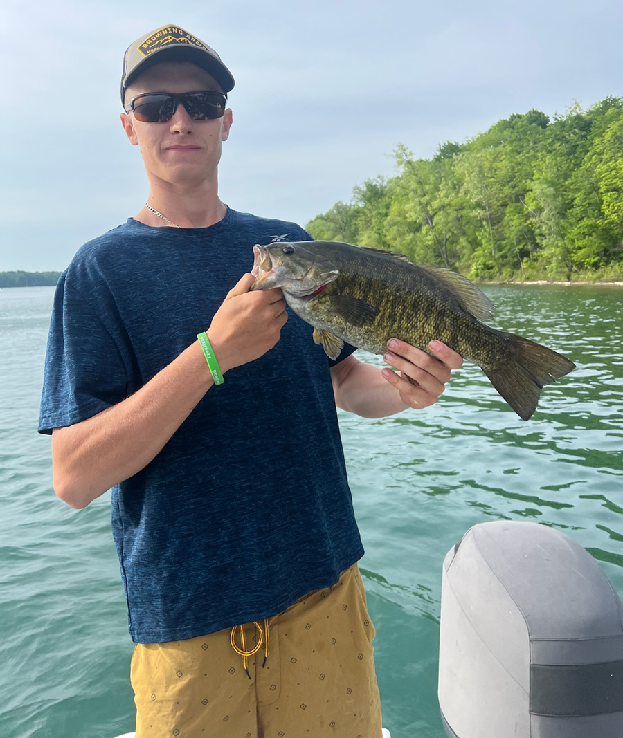 Jesse Fox with smallmouth bass