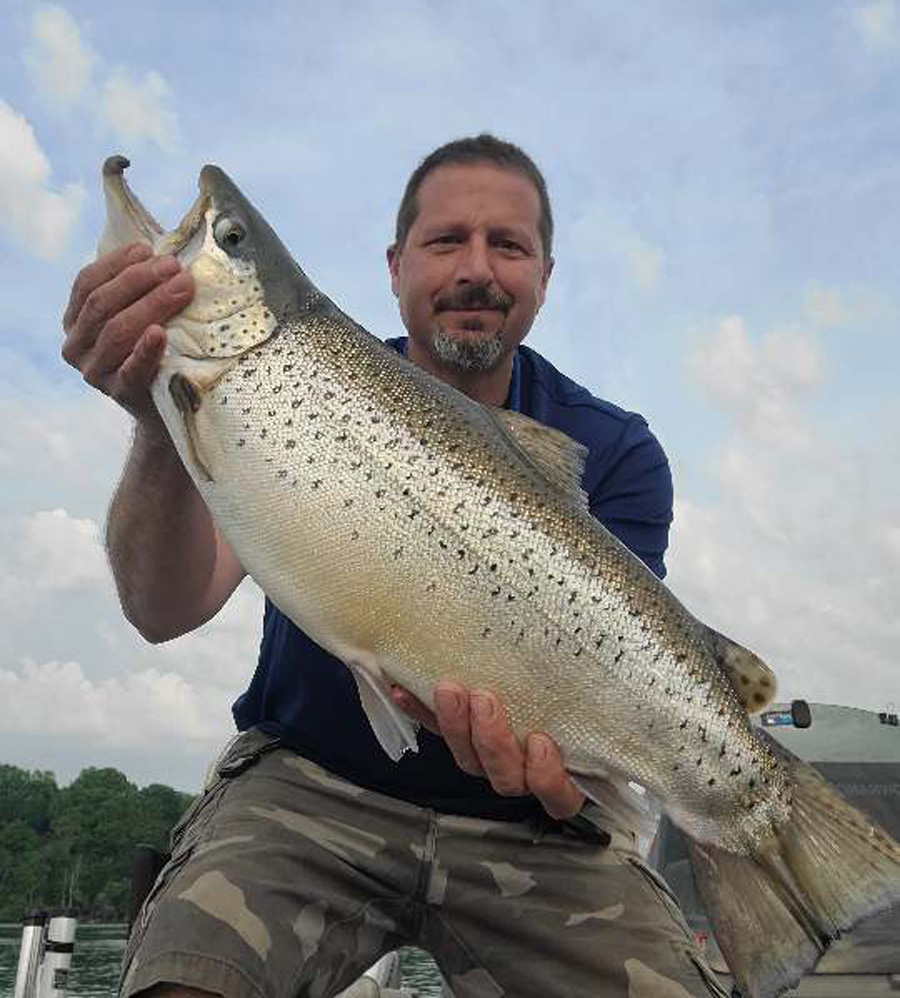 Capt. Dave Scipione with brown trout
