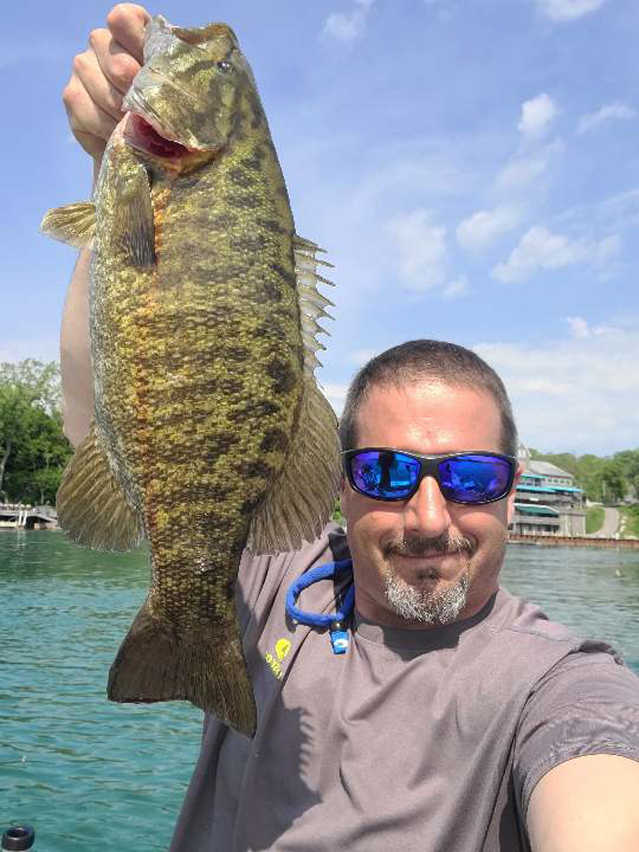 Capt. Dave Scipione with smallmouth bass
