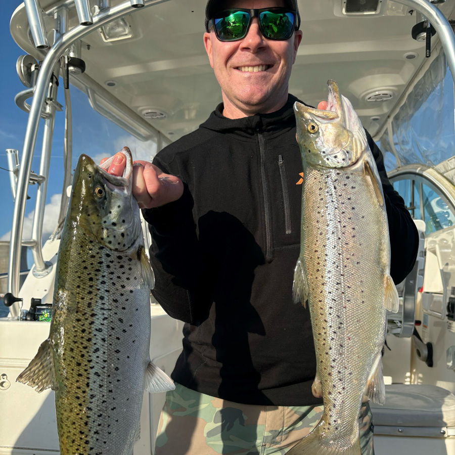 Ian P. with pair of brown trout