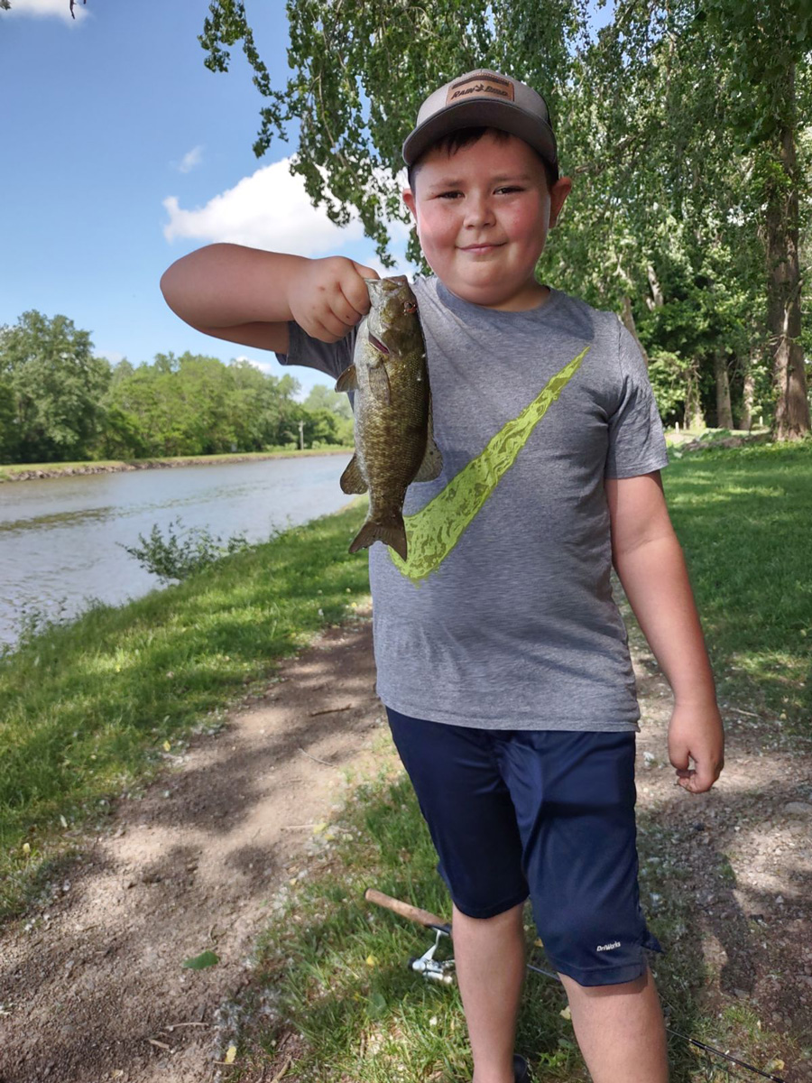 Parker Costello with smallmouth bass