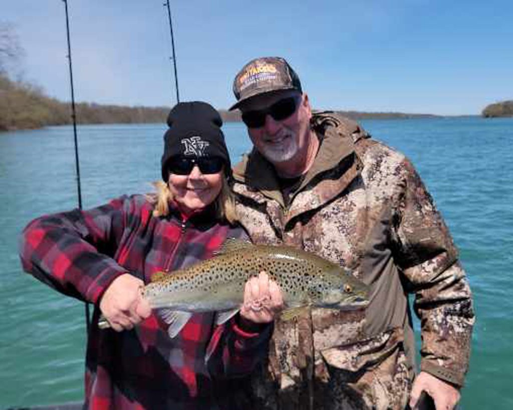 Stan and Dana with anniversary brown trout