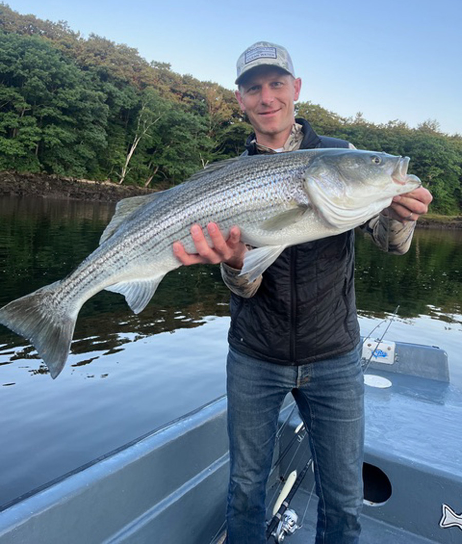 Jared Gordon with striped bass