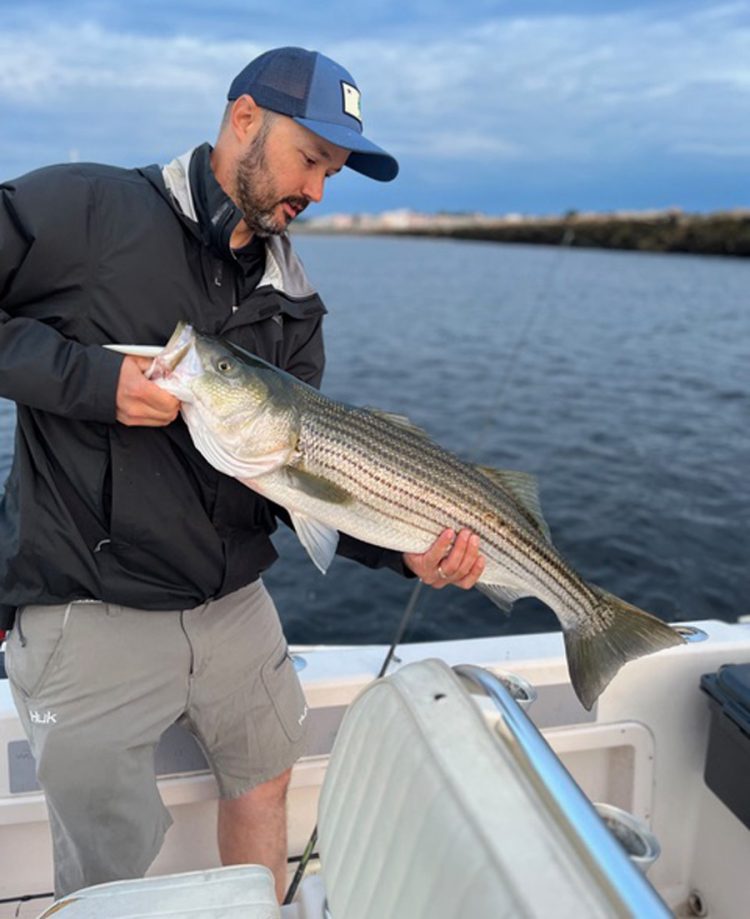 Jay Dutremble with striped bass