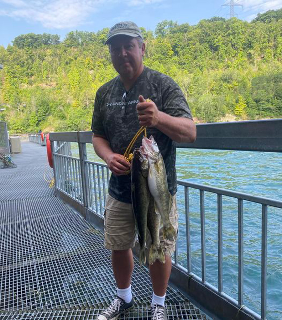 Tommy Holycross with walleyes