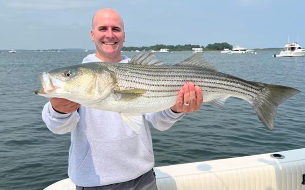 Jay Brown with striped bass