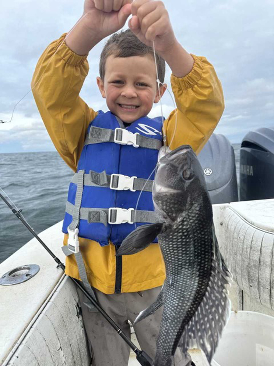 Leo with black sea bass