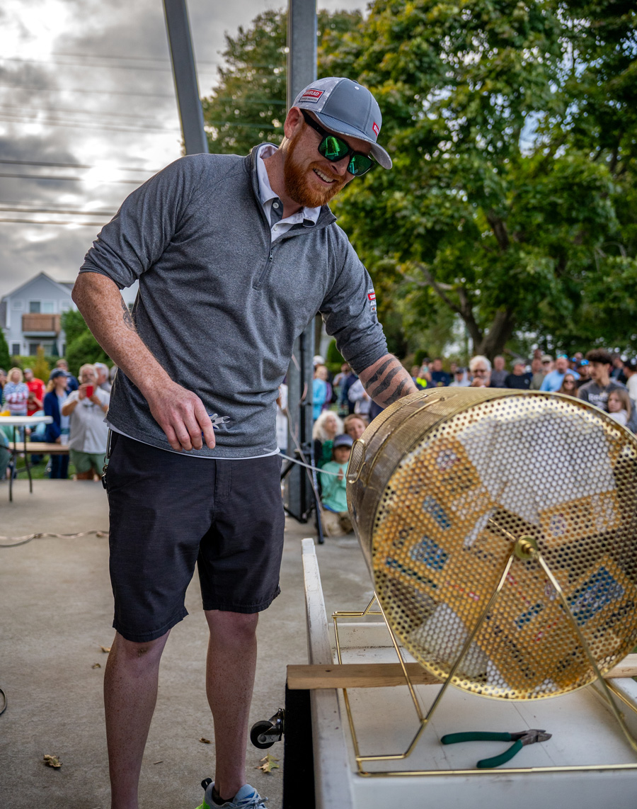 Joe Pechie from Simrad getting ready to pull the winning Golden Ticket