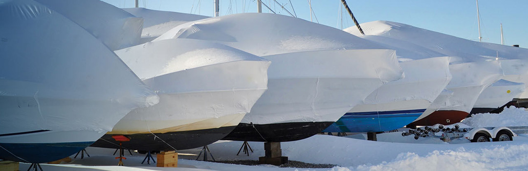 wrapped boats in snow