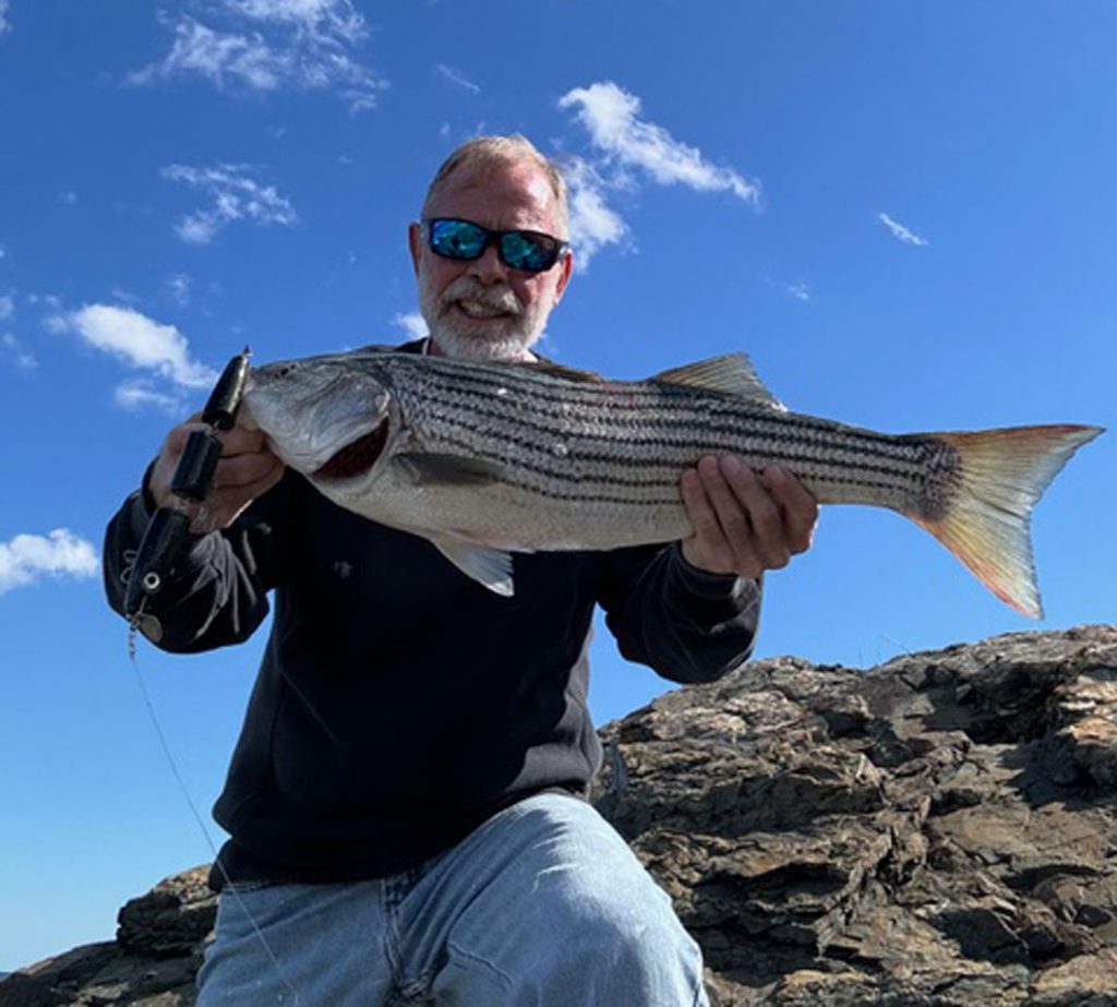 Dave &ldquo;the Dude&rdquo; Flaherty with striped bass