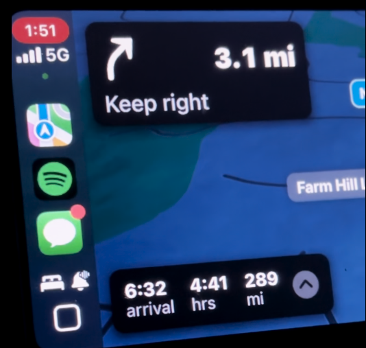 A carplay screen showing apple maps and a 289 mile drive