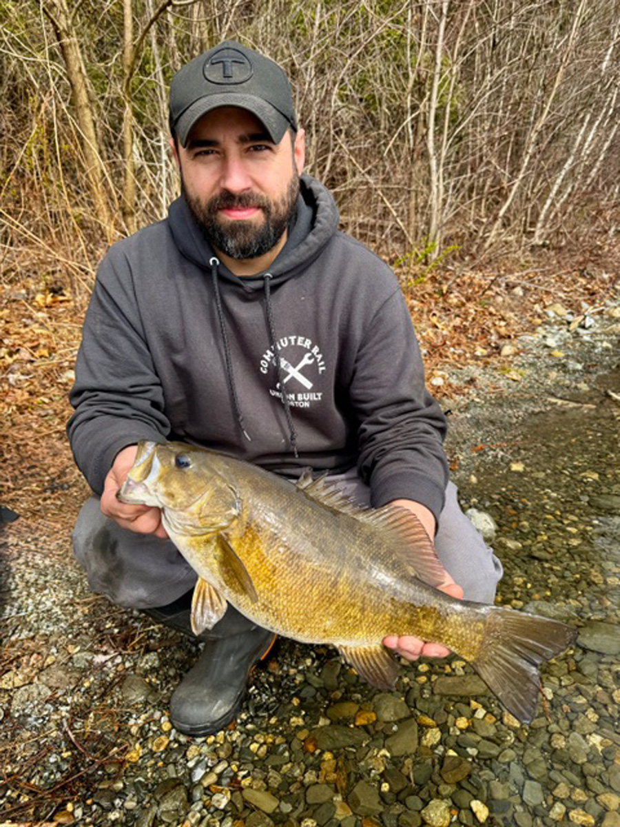 Steve Powers Jr with smallmouth bass