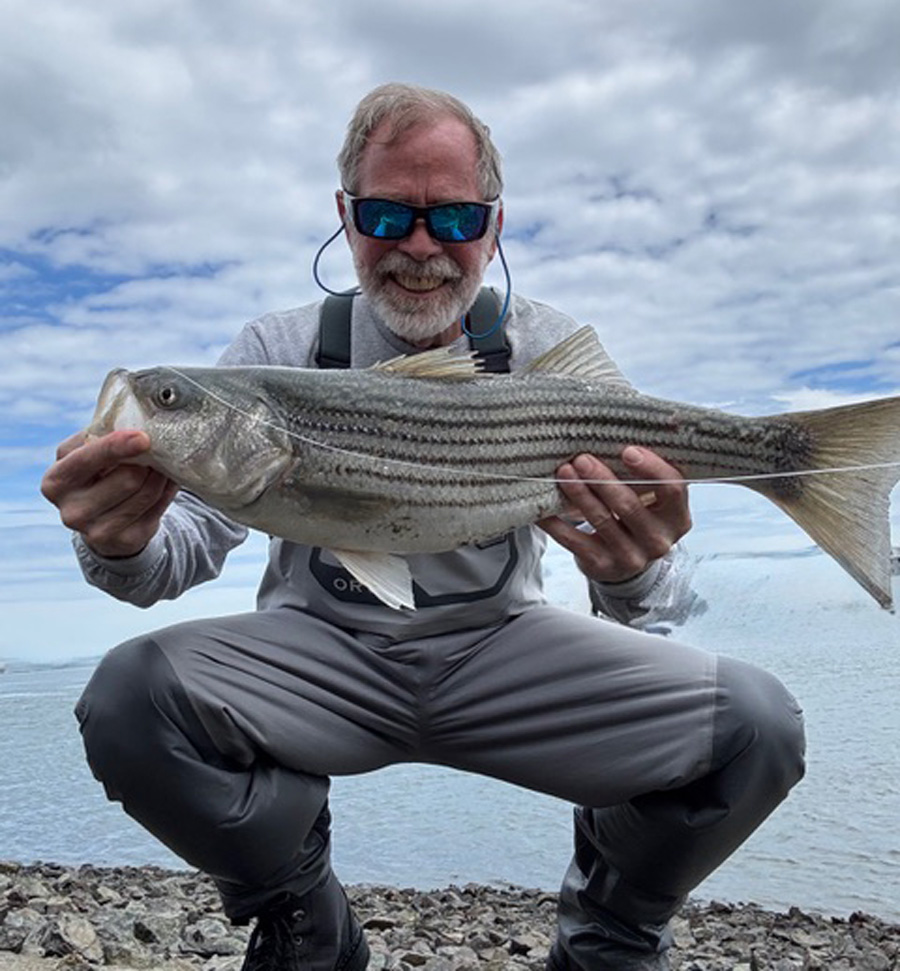 Dave “The Dude” Flaherty with striped bass