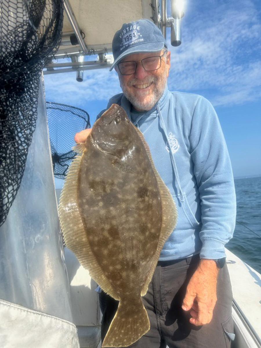 Mark &ldquo;Doc&rdquo; Feldman with keeper fluke