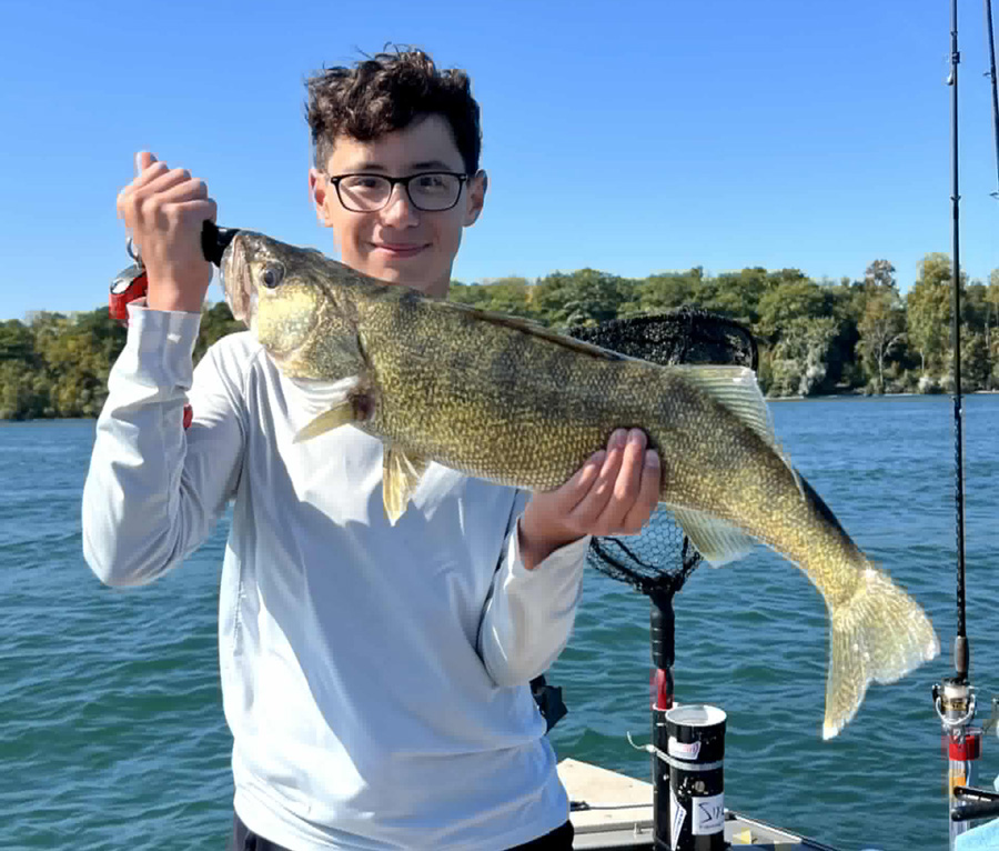 Elliot Chin with walleye