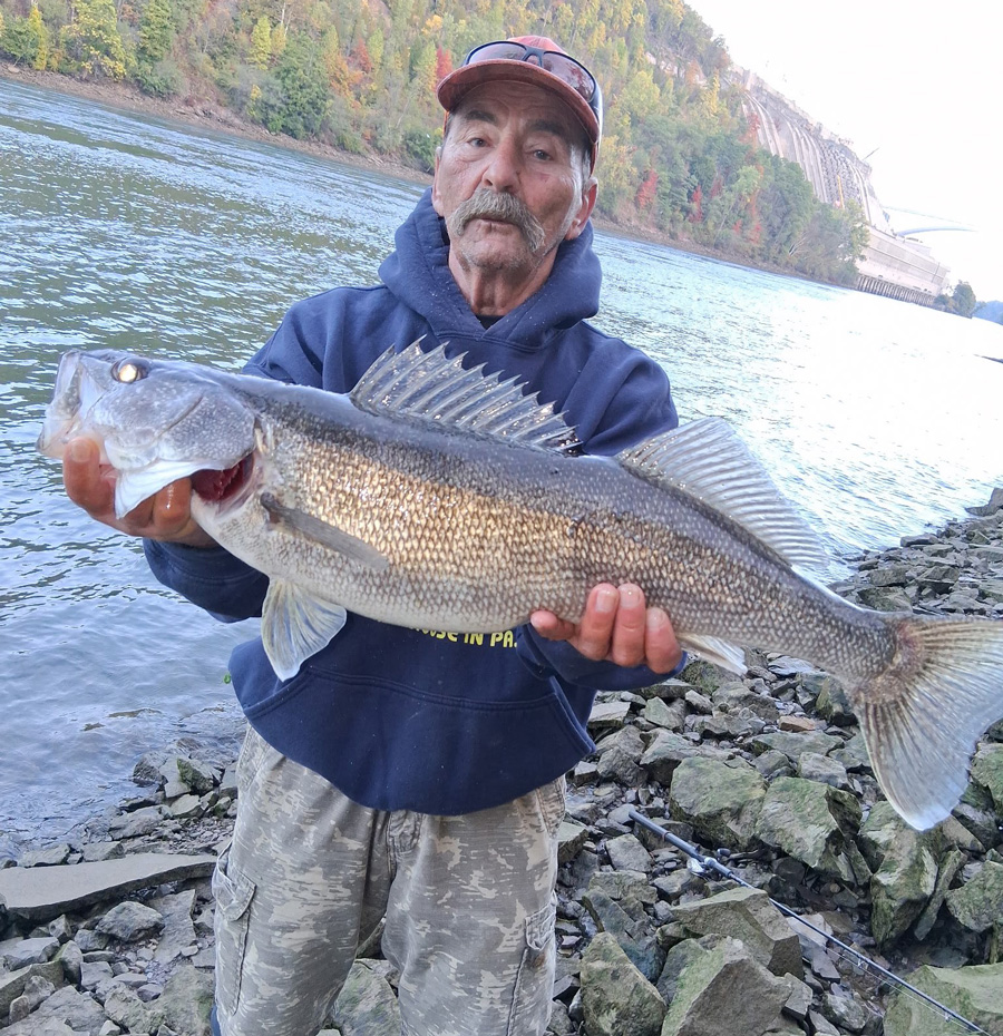 Larry Garabedian with walleye