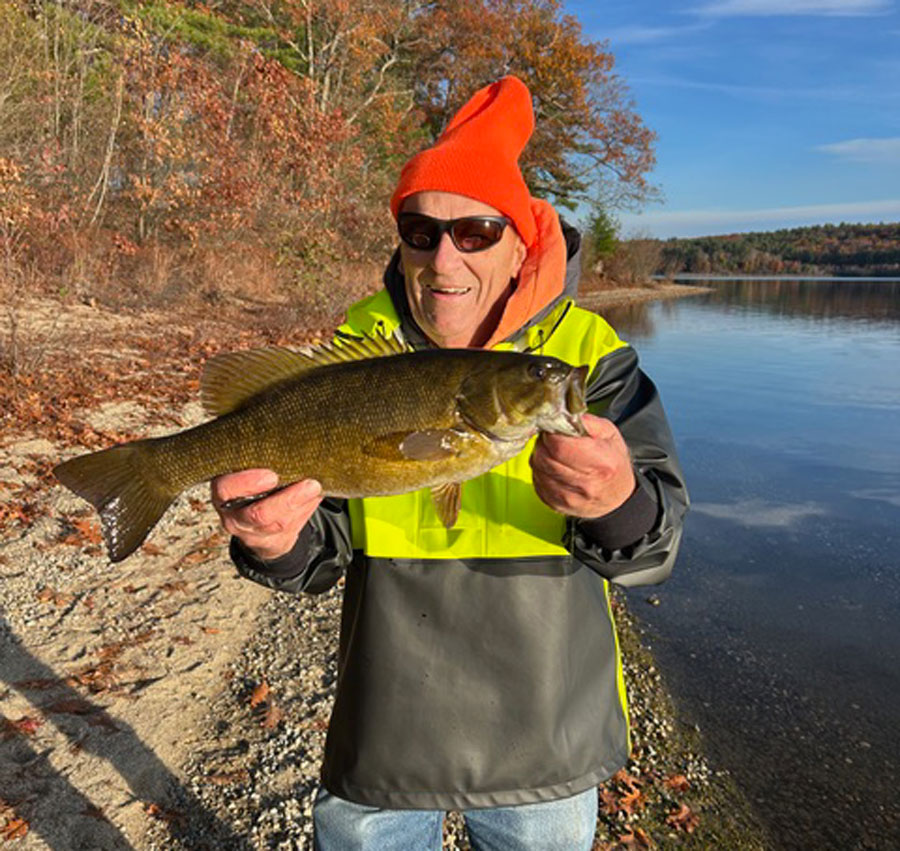 Billy Eicher with smallmouth bass