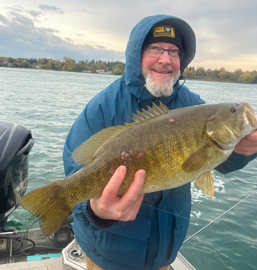 Alex Fritz with smallmouth bass