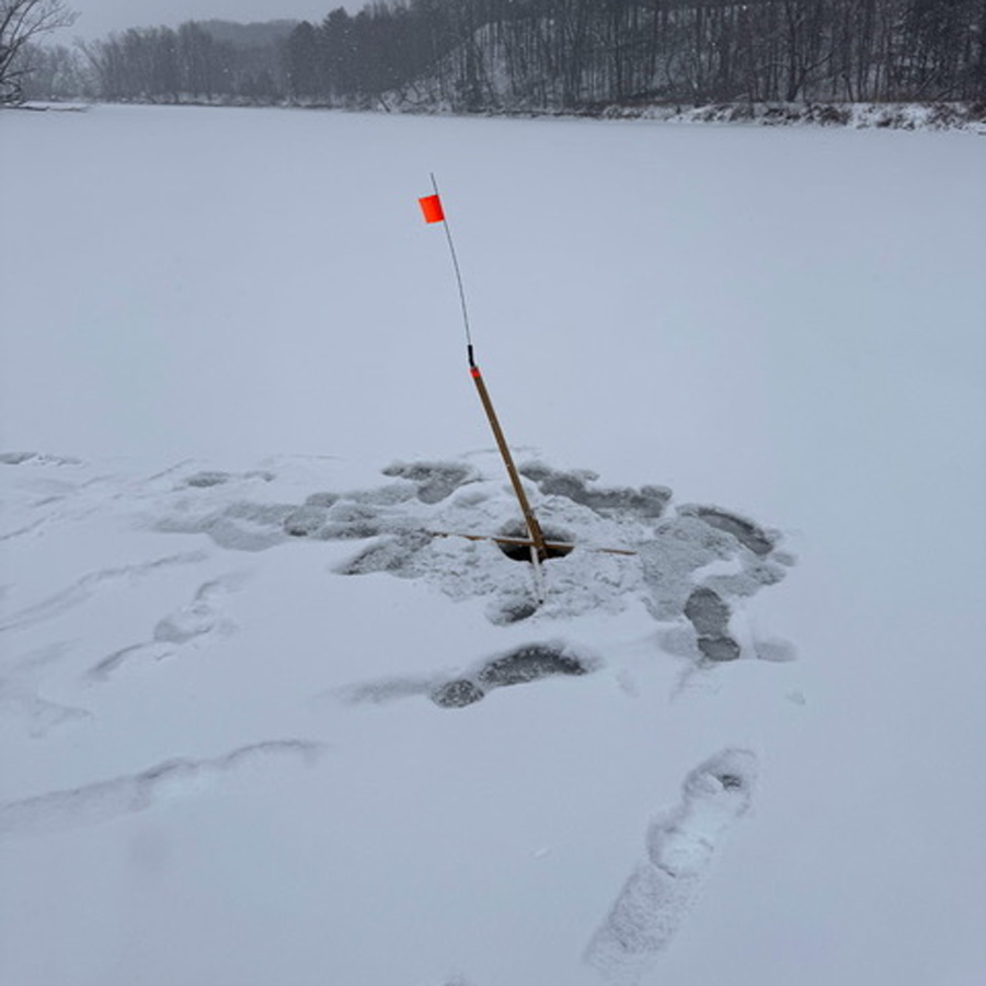 ice fishing flag along setback of the Connecticut River