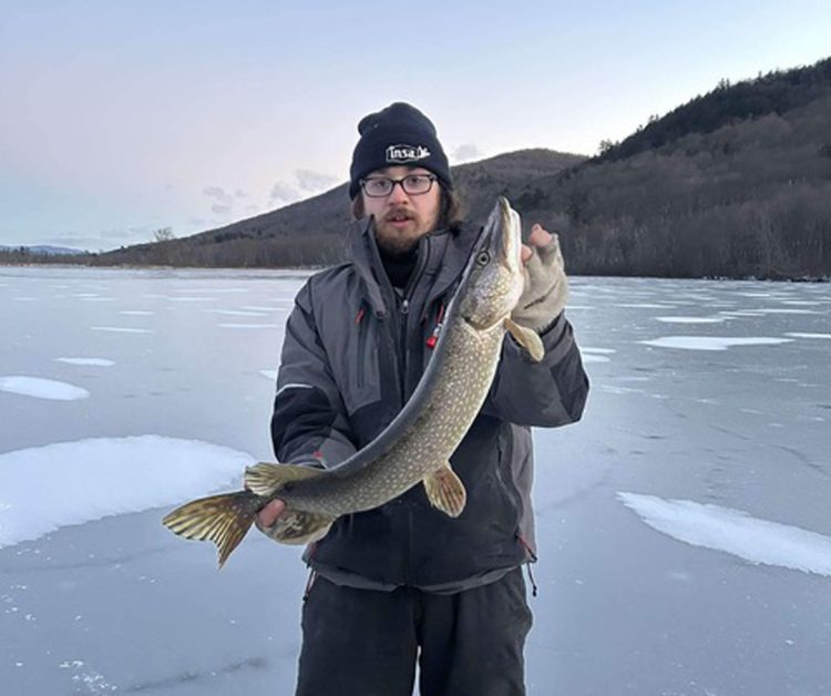 Josh from the Fishing Hole in South Hadley with a first ice pike.
