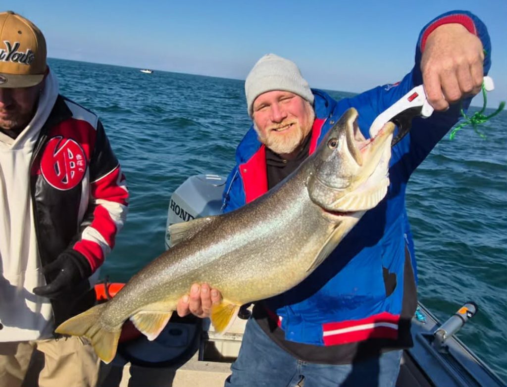 Travis Swearengen with lake trout