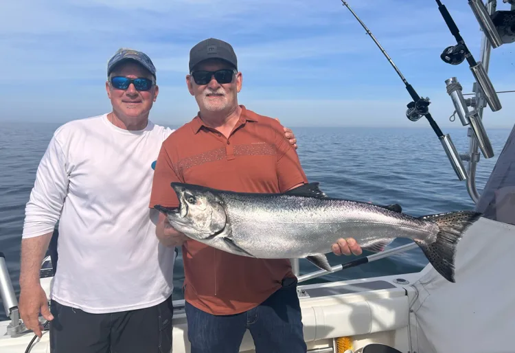 Buffalo Sabres coach Lindy Ruff with king salmon